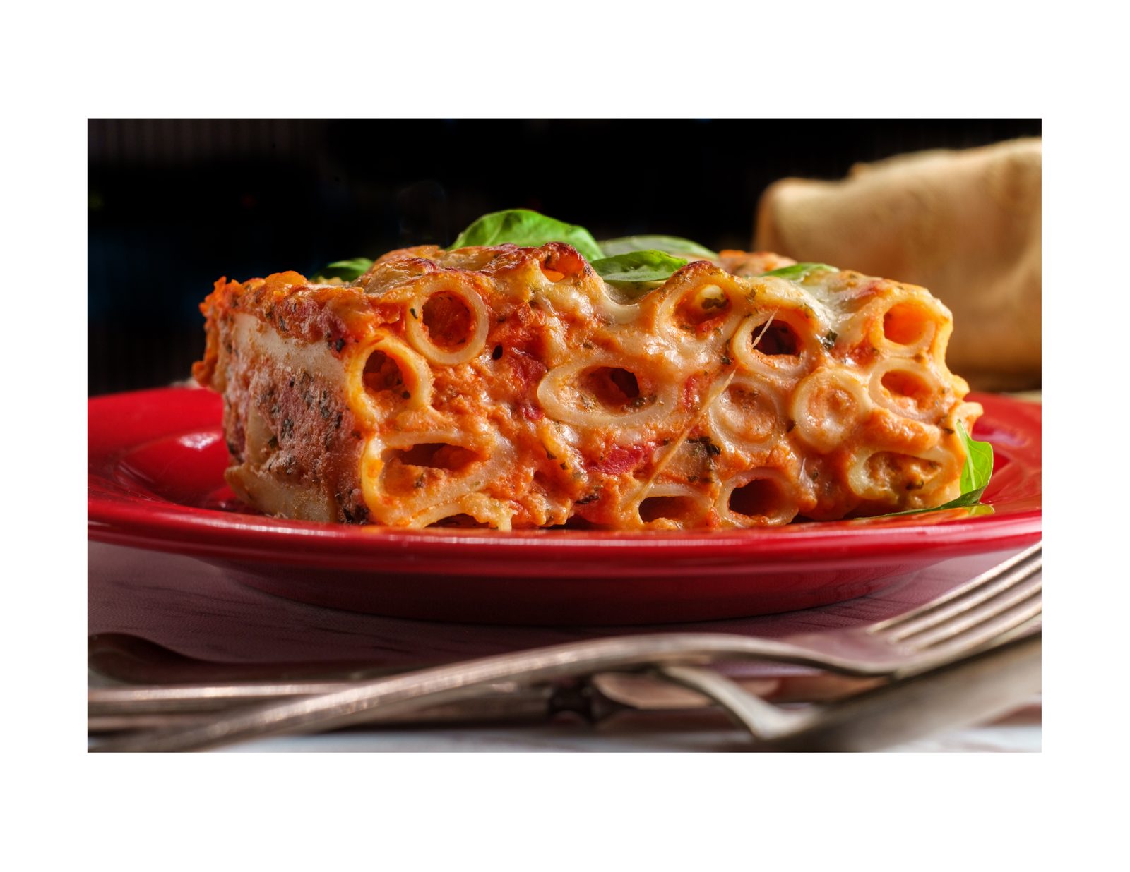 Spicy baked ziti with penne, tomato pepper sauce, mozzarella and provolone